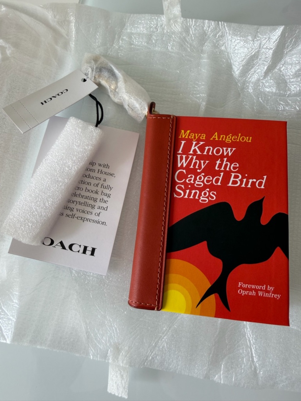 Coach book Maya Angelou I know why the caged bird sings Book bag Charm